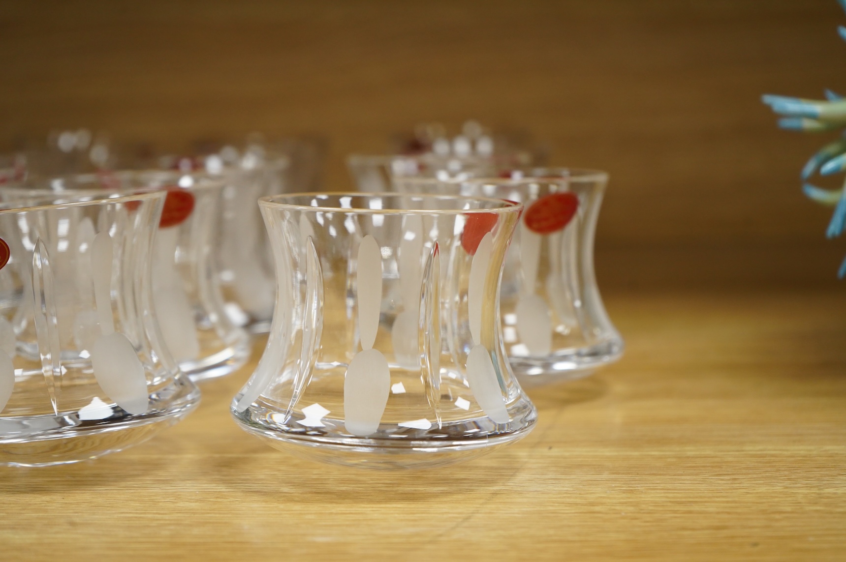 A collection of twenty five Uri Geller Crystal Collection whisky tumblers by Dickenson Crystal, 9cm high